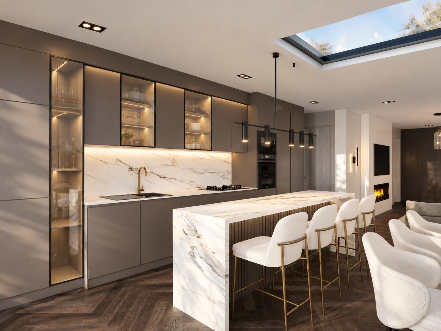 Bespoke kitchen with an island, warm cabinetry and skylight
