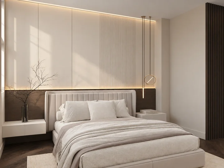 First principal bedroom with a softly illuminated upholstered headboard